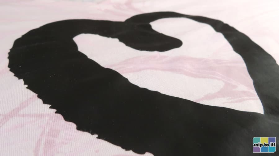 closeup of black walakut soft HTV on a cotton-modal blend