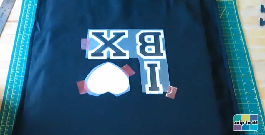 setup of the third press - the stripflock varsity letters and stripflock out line for the heart