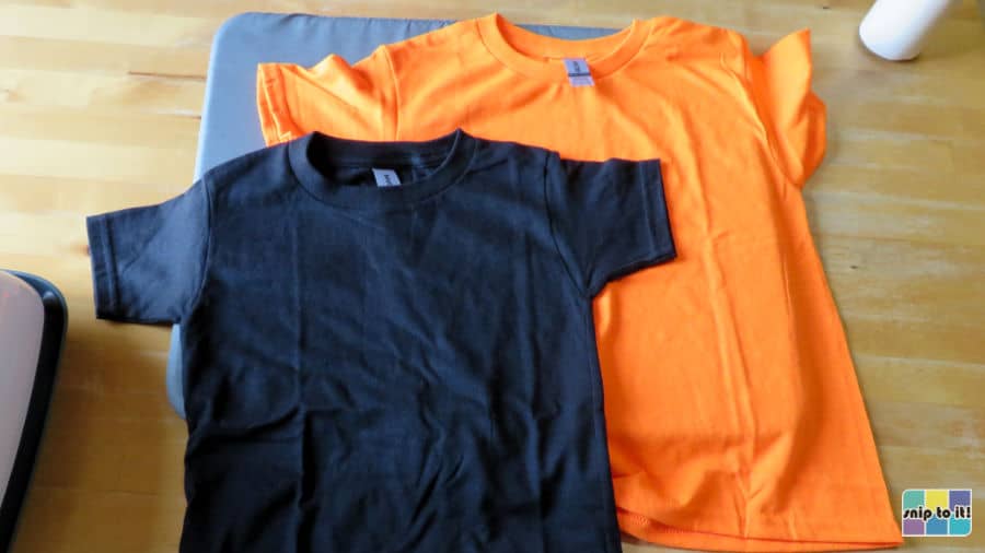 photo of blank orange and black Gildan T-shirts used for this project