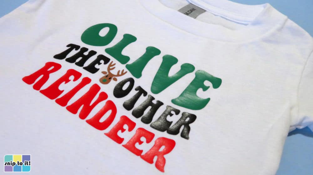 closeup of Olive the other reindeer stacked warped text shirt