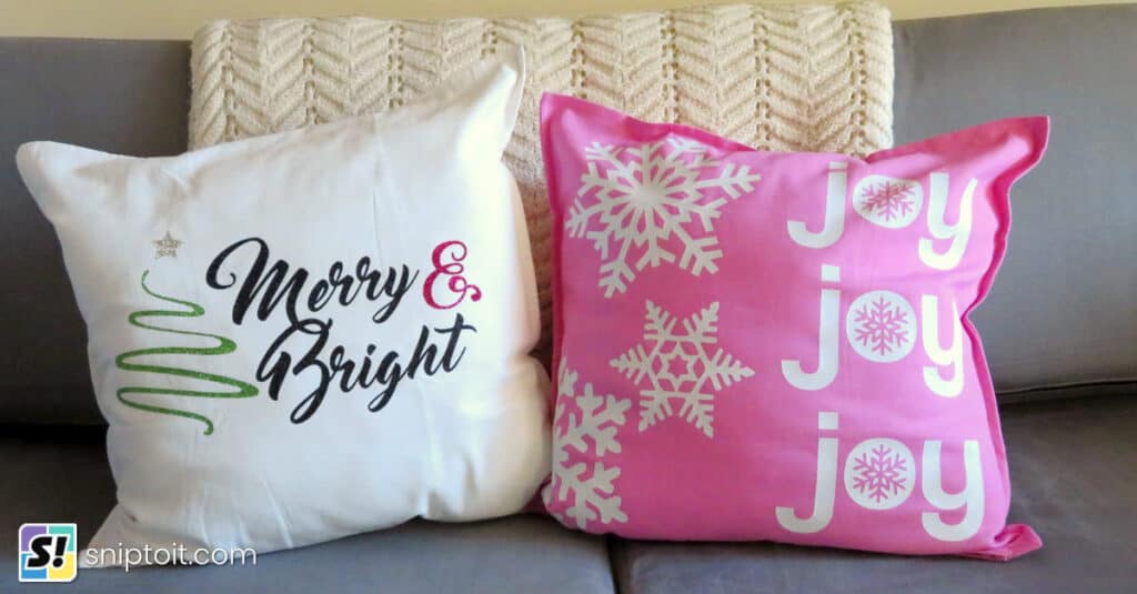 glitter holiday throw pillows decorated with siser htv, white pillow with merry & bright design, pink pillow with joy joy joy design