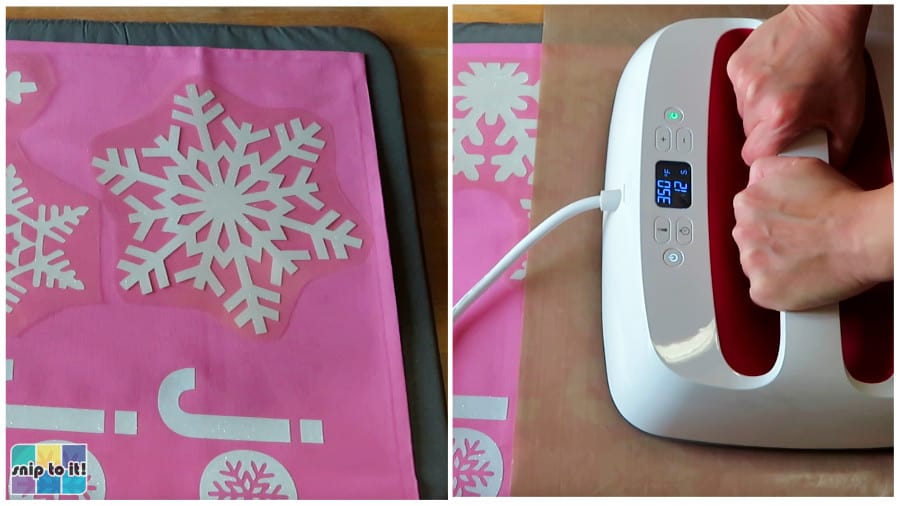 final part of joy design, top white glitter snowflake, being pressed on pink pillowcase