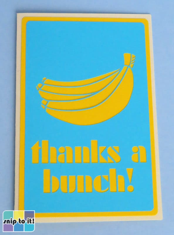 cricut thank you card made using banana image + Sistemas stencil font cut out of blue cardstock on a yellow cardstock background