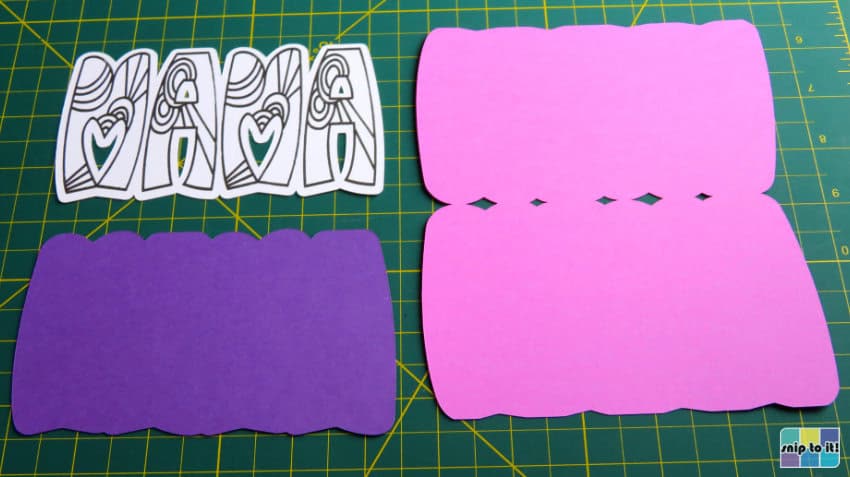 photo of all finished pieces of mama card ready to be assembled, white pink and purple cardstock layers