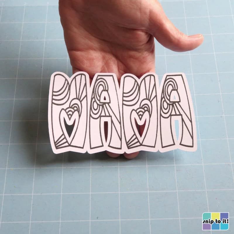 finished white cardstock layer, MAMA drawn in black glitter gel pen on white cardstock