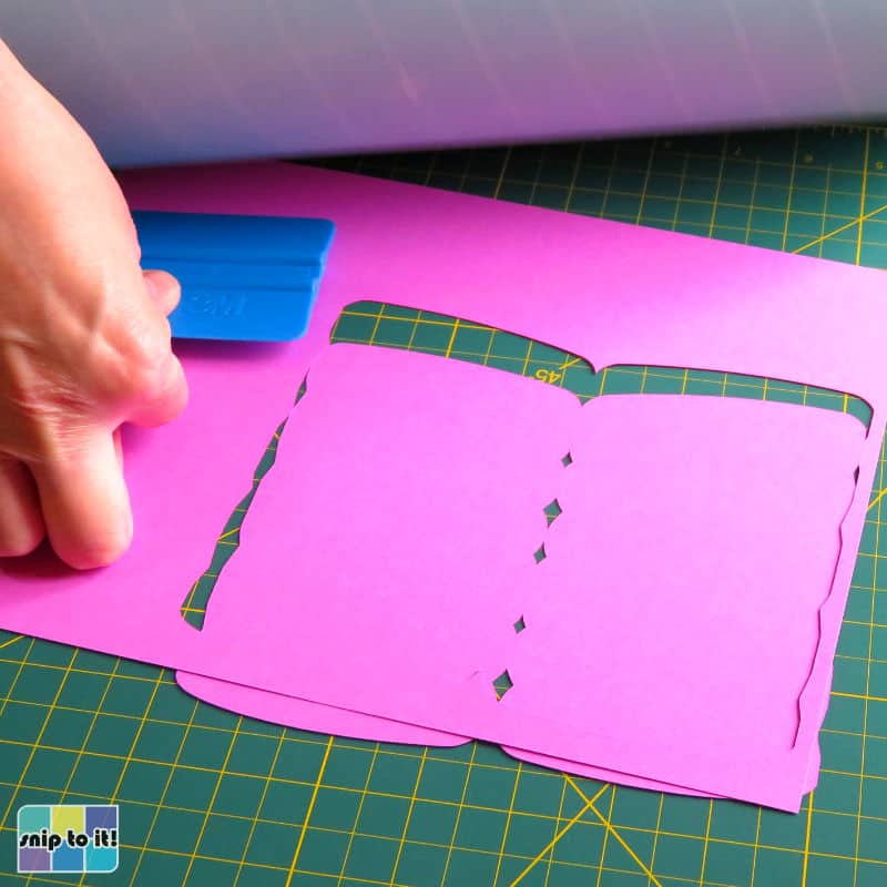photo of removing pink cardstock card base from cutting mat
