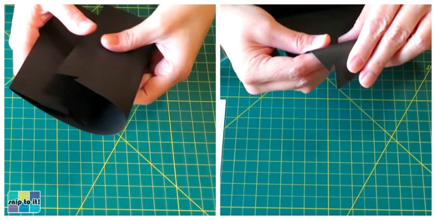 photo of folding 2 sides of the tuxedo envelope inward and folding the lapels back