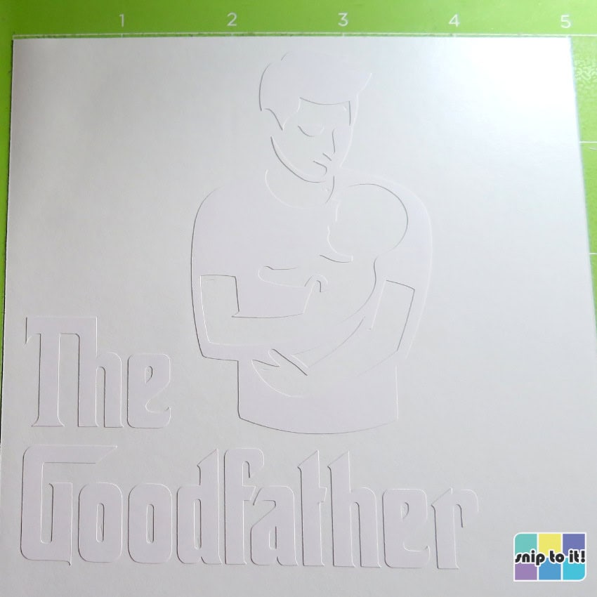 closeup image of white vinyl image that has been completely weeded and is ready to transfer