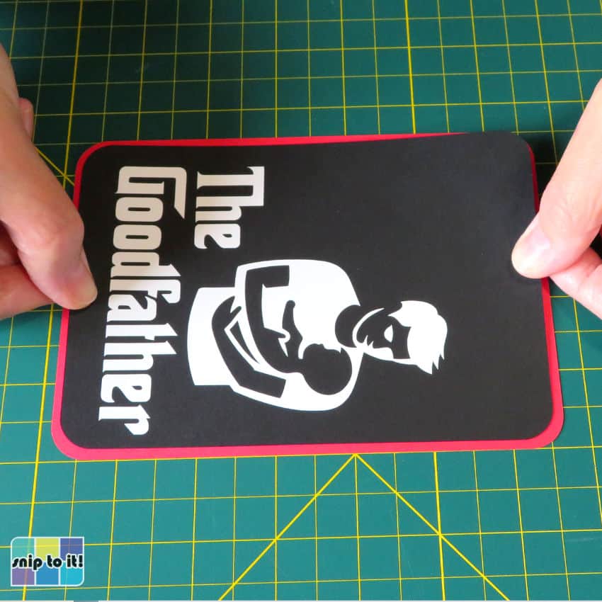 photo of positioning The Goodfather cardstock panel on red cardstock layer