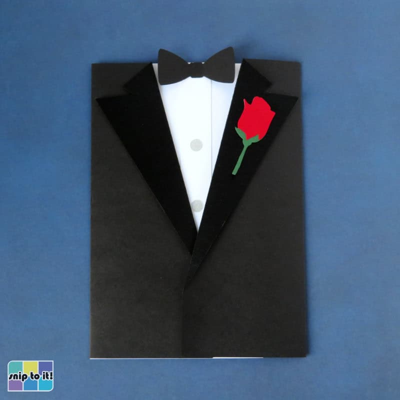 photo of a finished tuxedo envelope closed against a dark blue background.