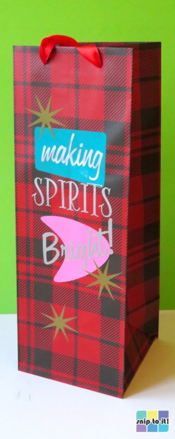 buffalo check print wine bag decorated with a mid-century modern style captioned "making spirits bright"