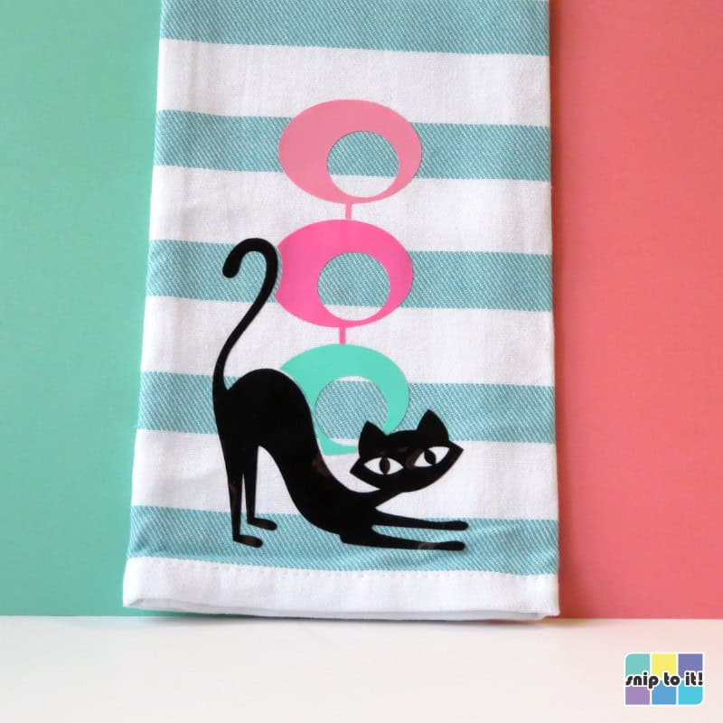 mid century cat and abstract circles design, vinyl on a kitchen towel