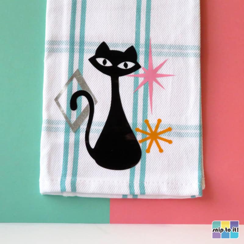 mid century cat and starburst design, vinyl on a kitchen towel