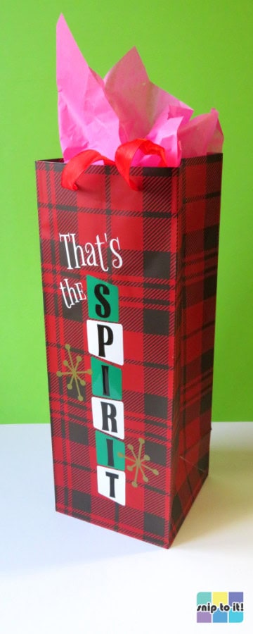 buffalo check print wine bag with the slogan "that's the spirit" applied in the mid century modern aesthetic