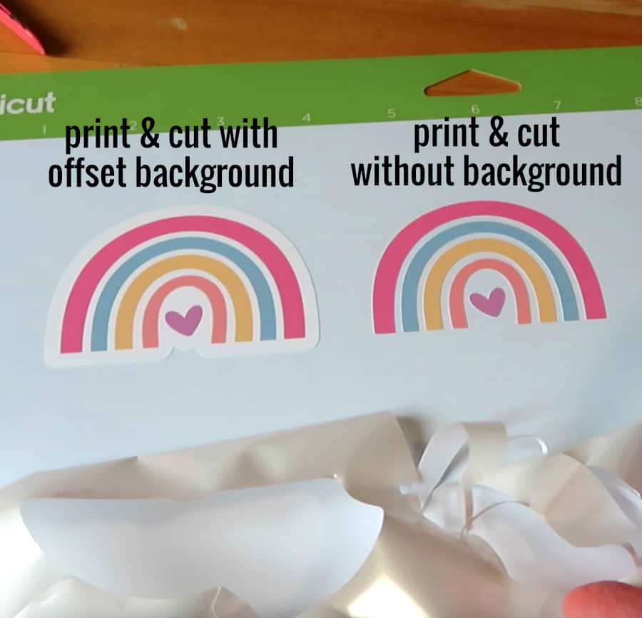 image comparing two rainbow stickers completed with the Cricut print and cut operation, one with a background offset layer and one without a background layer