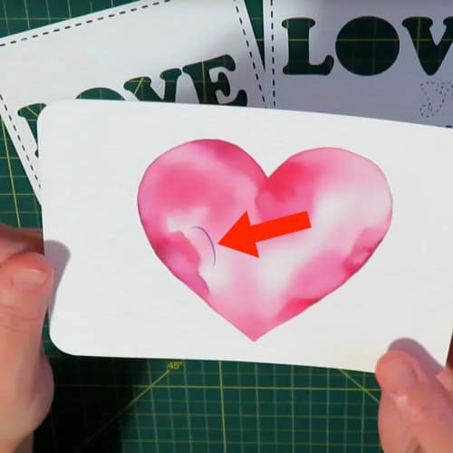 photo of completed stack of spacers and top printed layer for the counter of the O in LOVE for the recessed text eclipse card