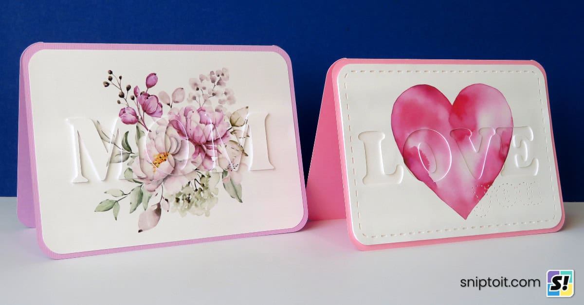 photo of raised text Mother's Day eclipse card next to recessed text Valentine's Day card