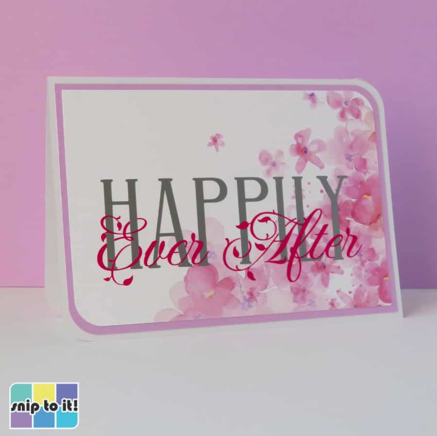 photo of card with HAPPILY in silver vinyl intertwined with Ever After in hot pink vinyl