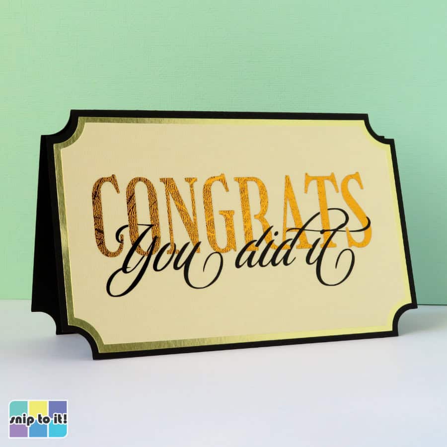 photo of card with CONGRATS intertwined with You did it in script, lettering in gold textured metallic and black vinyls