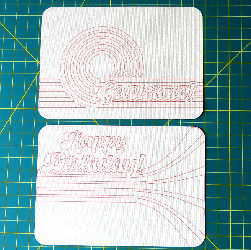 photo showing front and inside base panels for retro birthday card, each has a drawn guideline for design elements