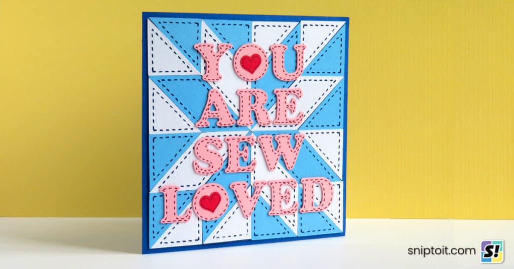 Cricut Stitch line hack feature image, showing a closeup of a homemade card decorated with faux stitching cut and drawn with a Cricut machine