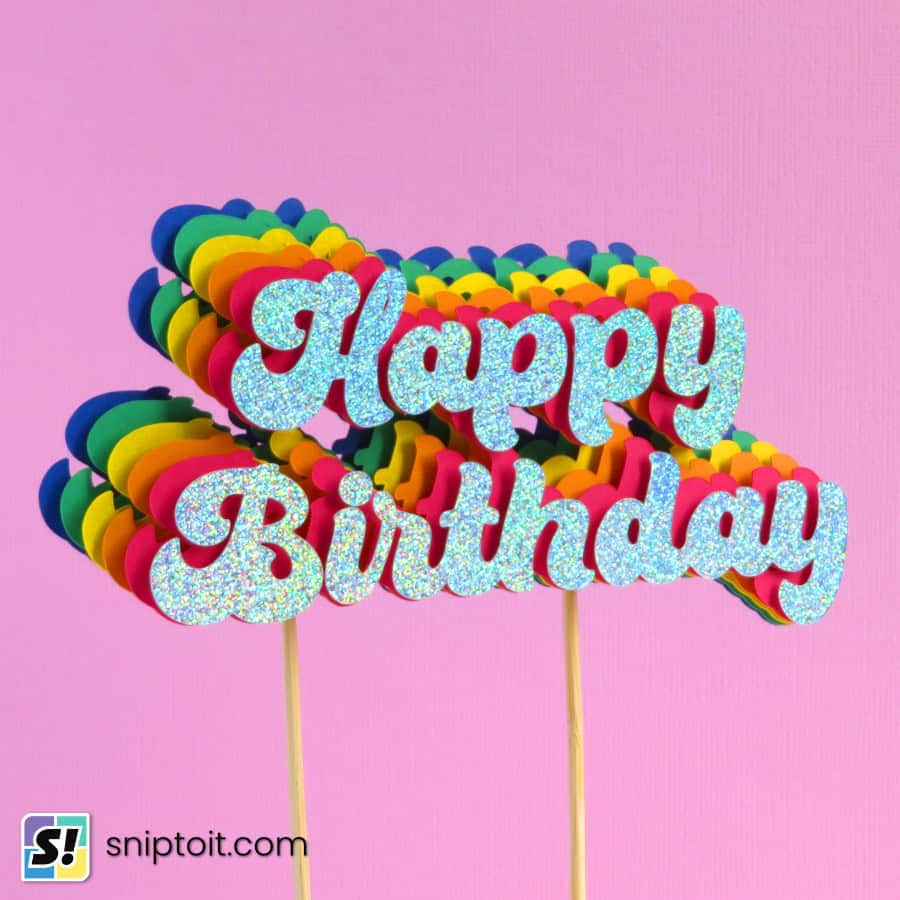 closeup photo of finished rainbow text effect birthday cake topper featuring six layers of colored text cascading from left to right