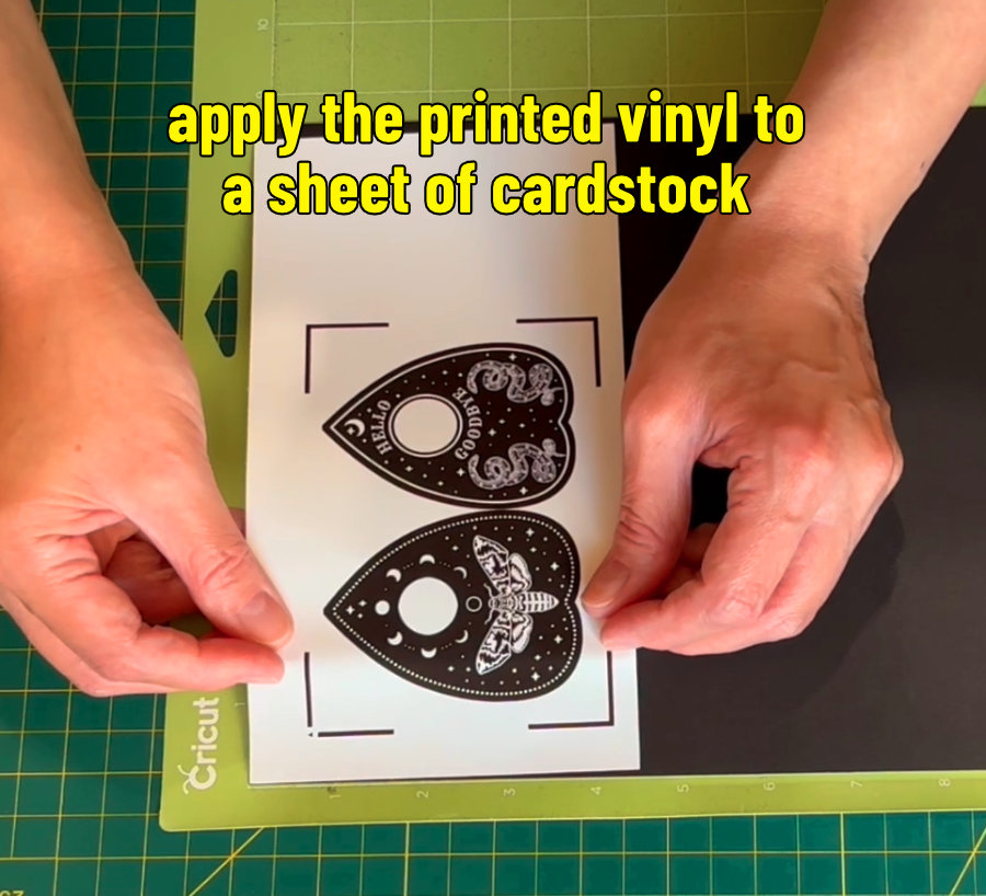 photo of applying printable vinyl to heavy cardstock once the planchette images are printed