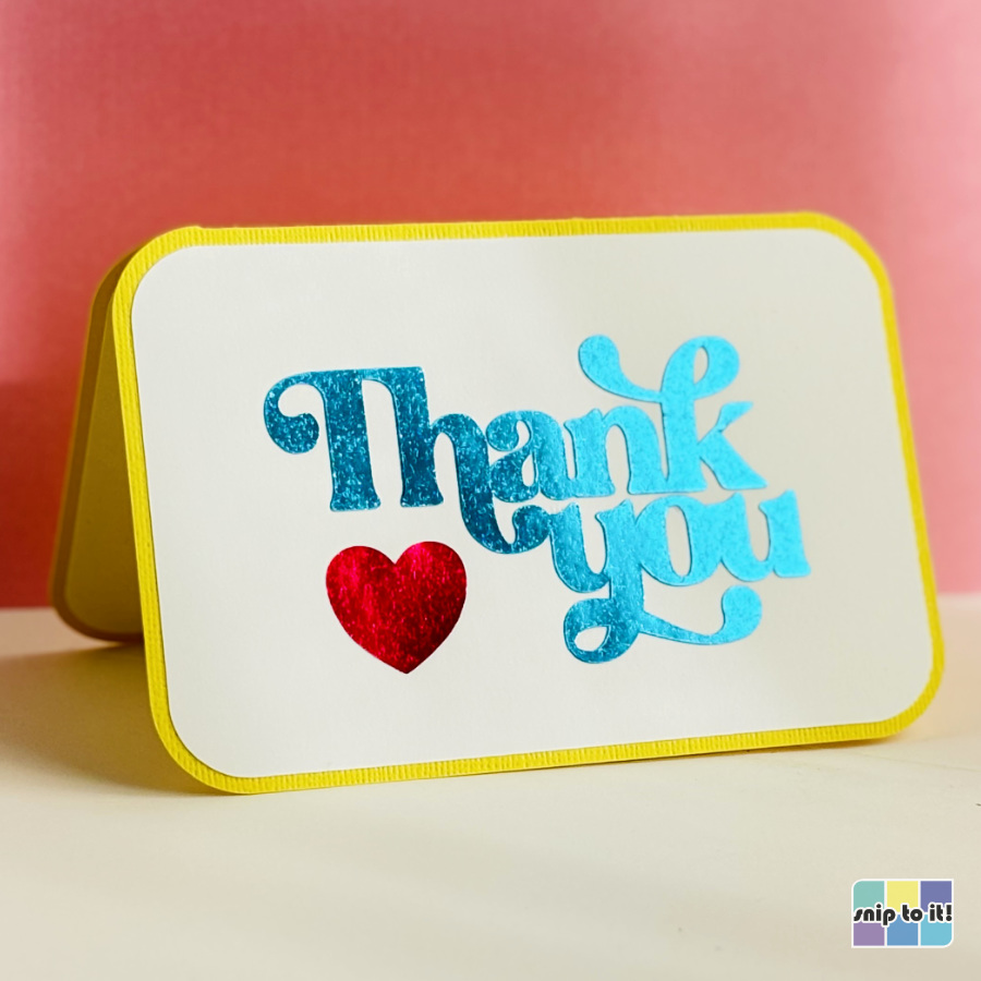 photo of finished thank you card showing foiled adhesive lettering and heart