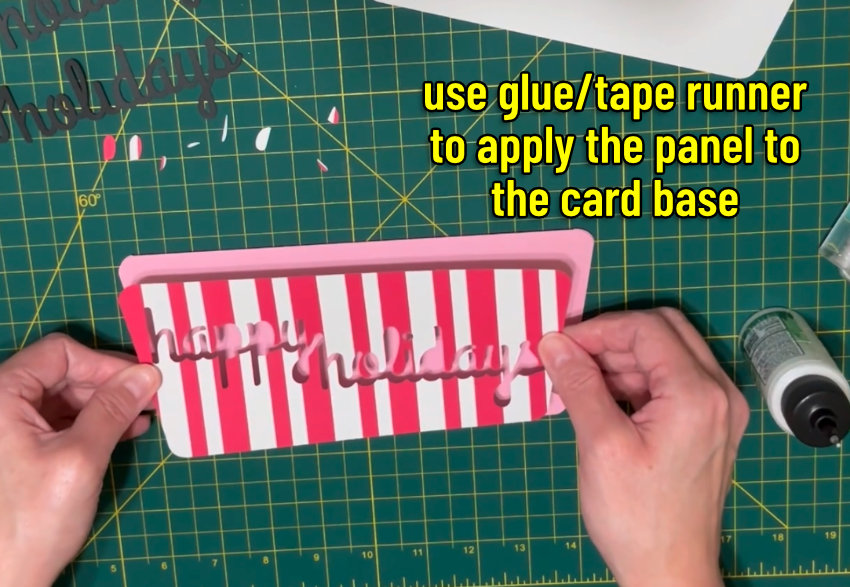 image showing the custom striped cardstock panel being placed onto the card base
