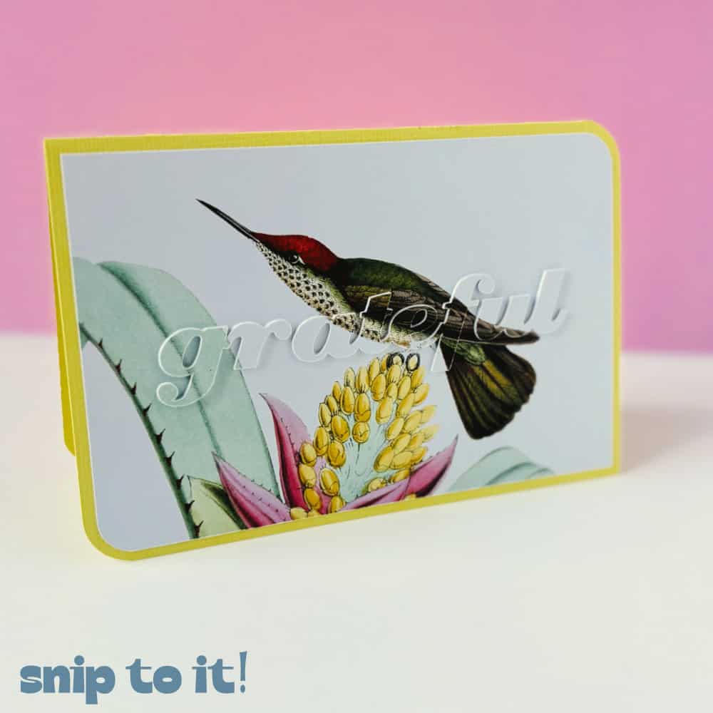 photo of completed, assembled eclipse card made in cricut design space using the material-saving method, where the top printed text and base panel are each made using stepwise slicing and flattening.